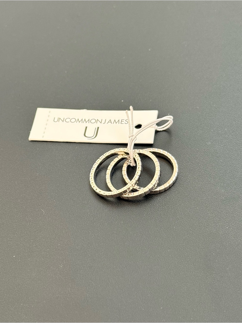 Set of 3 Uncommon James Stackable Rings Set in silver plated metal sz 5